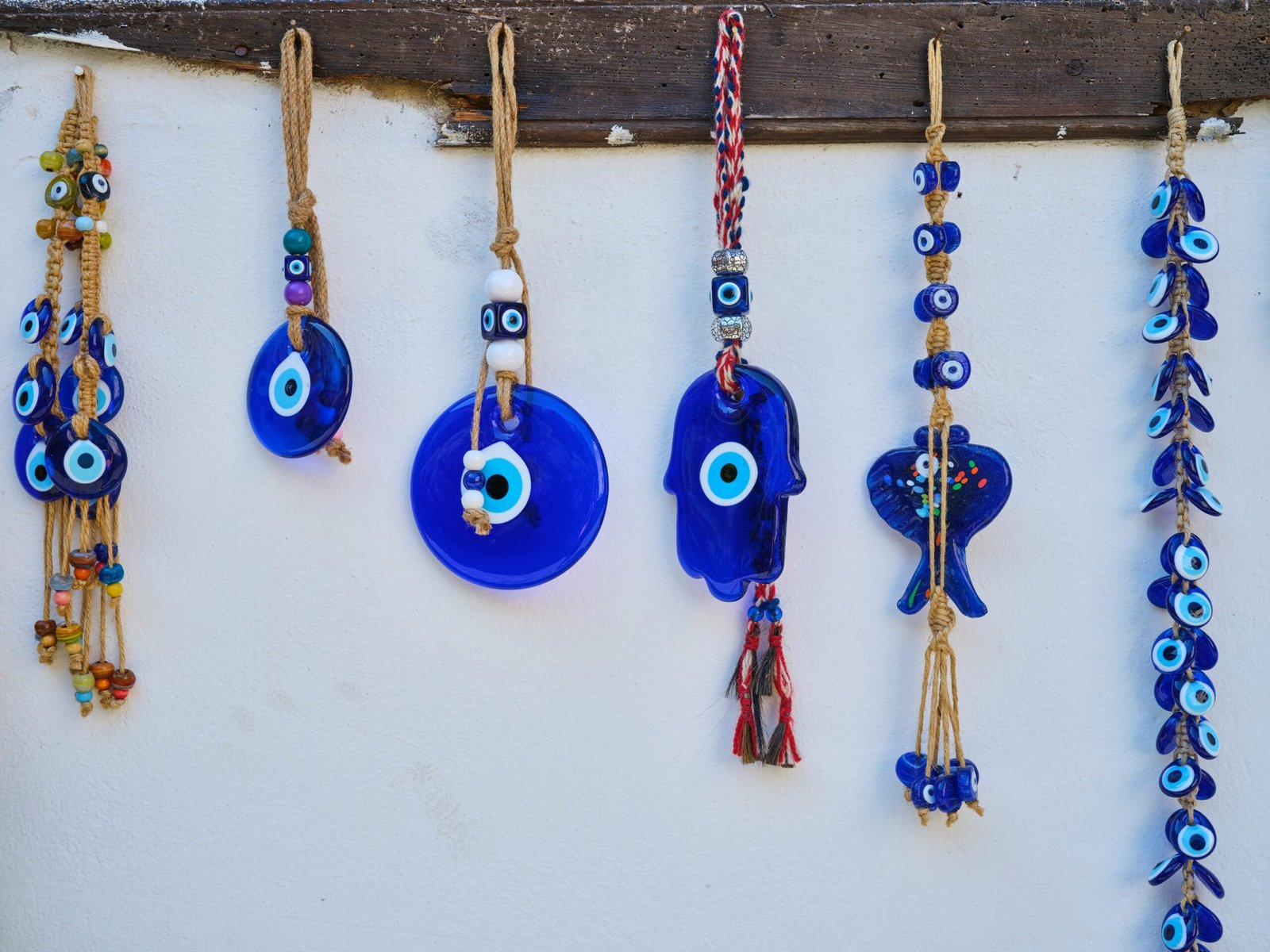 a group of colorful earrings